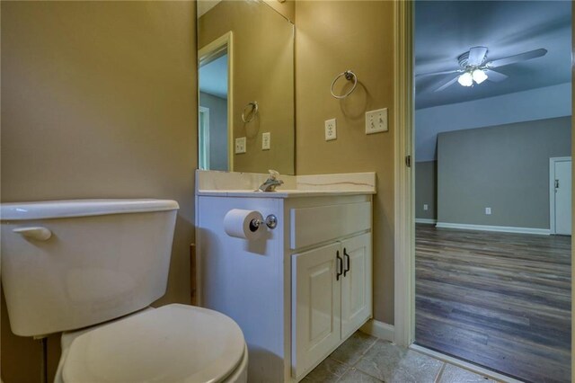 116 Woolsey Creek Trl, Fayetteville, GA 30215 - half bath with ceiling fan, toilet, vanity, and baseboards