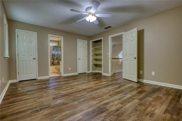 116 Woolsey Creek Trl, Fayetteville, GA 30215 - unfurnished bedroom with wood finished floors, baseboards, ensuite bathroom, and a ceiling fan