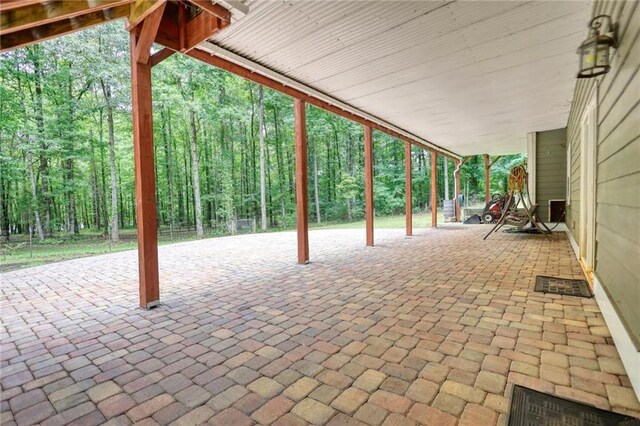 116 Woolsey Creek Trl, Fayetteville, GA 30215 - view of patio / terrace with a wooded view