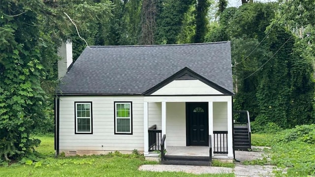 15 Harlan Rd, Atlanta, GA 30311 - bungalow-style home with a chimney, a front lawn, and a shingled roof