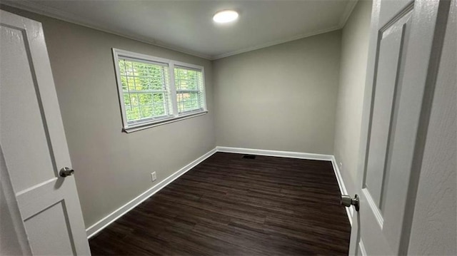 15 Harlan Rd, Atlanta, GA 30311 - unfurnished bedroom featuring ornamental molding, dark wood finished floors, and baseboards