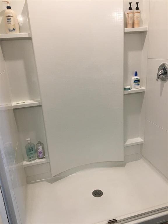 bathroom featuring a shower