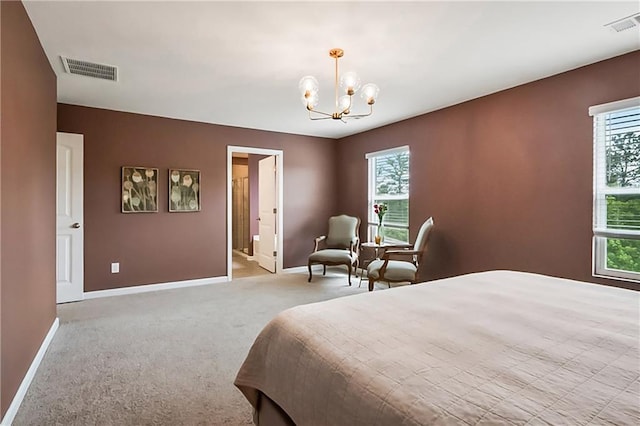 108 Wildflower Trce, Dallas, GA 30132 - bedroom with baseboards, a chandelier, light colored carpet, and ensuite bath