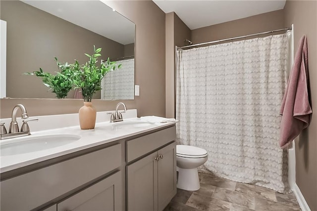 108 Wildflower Trce, Dallas, GA 30132 - bathroom with toilet, double vanity, and curtained shower