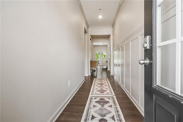 108 Wildflower Trce, Dallas, GA 30132 - hall with dark wood-type flooring, baseboards, and crown molding