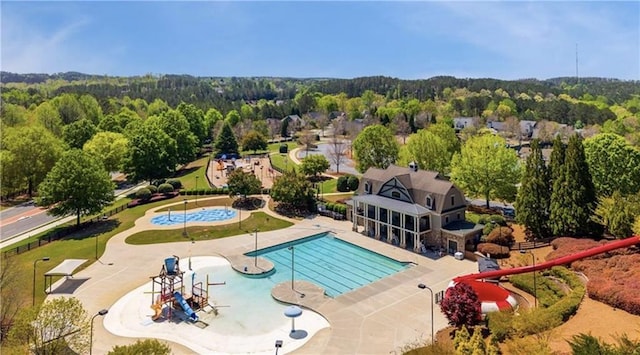 108 Wildflower Trce, Dallas, GA 30132 - bird's eye view of a heavily wooded area and a pool