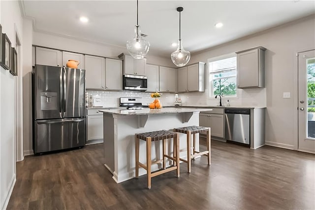 108 Wildflower Trce, Dallas, GA 30132 - kitchen with stainless steel appliances, gray cabinetry, plenty of natural light, tasteful backsplash, and recessed lighting