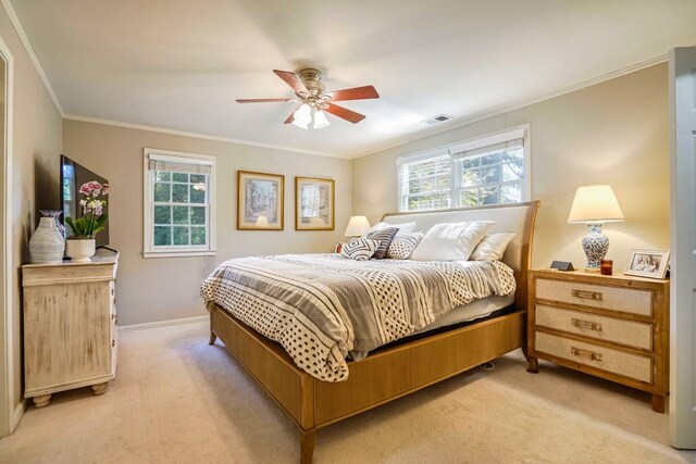 2195 Edison Ave NE, Atlanta, GA 30305 - bedroom with multiple windows, light carpet, visible vents, and ornamental molding