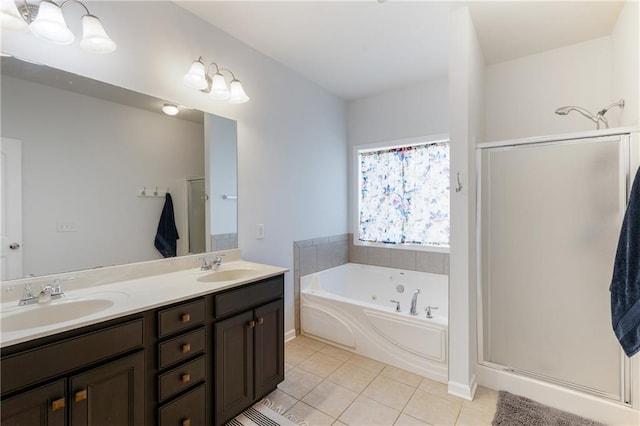 full bath with tile patterned flooring, double vanity, a stall shower, a tub with jets, and a sink