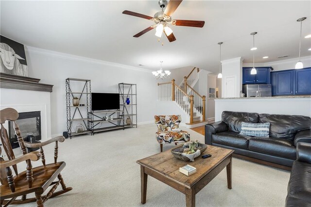 living room featuring stairway, baseboards, a fireplace, ornamental molding, and light carpet