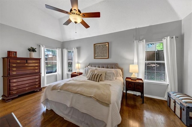 10535 Willow Meadow Cir, Alpharetta, GA 30022 - bedroom with wood finished floors, a ceiling fan, and high vaulted ceiling