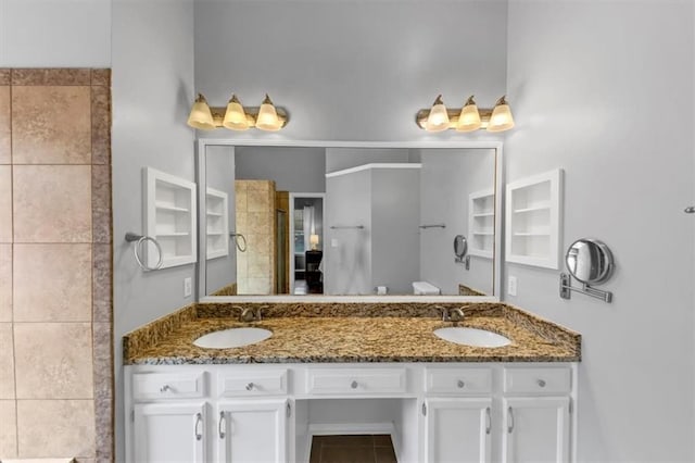 10535 Willow Meadow Cir, Alpharetta, GA 30022 - full bathroom with double vanity, tiled shower, and tile patterned flooring