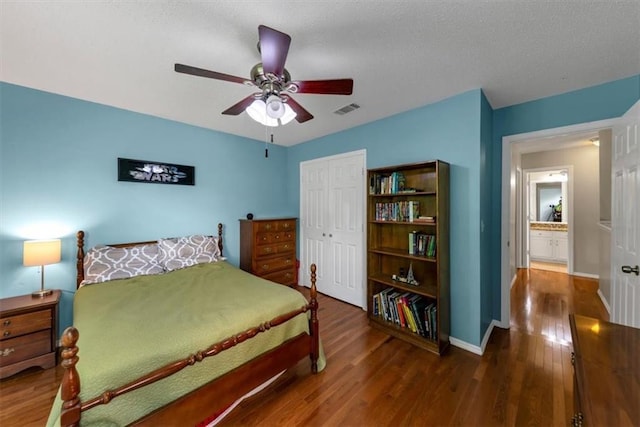 10535 Willow Meadow Cir, Alpharetta, GA 30022 - bedroom with wood finished floors, a closet, ceiling fan, and a textured ceiling