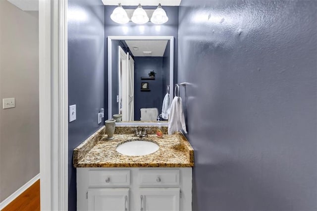 10535 Willow Meadow Cir, Alpharetta, GA 30022 - bathroom with vanity and wood finished floors