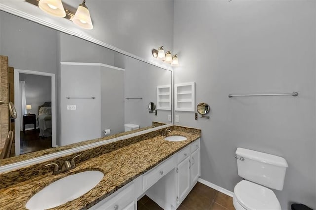 10535 Willow Meadow Cir, Alpharetta, GA 30022 - bathroom featuring ensuite bath, tile patterned flooring, and double vanity
