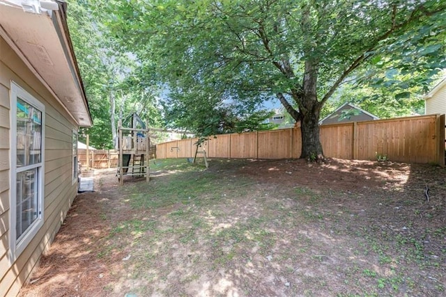 10535 Willow Meadow Cir, Alpharetta, GA 30022 - fenced backyard featuring a playground