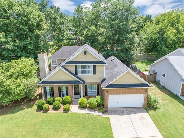 10535 Willow Meadow Cir, Alpharetta, GA 30022 - view of front facade featuring a garage, brick siding, concrete driveway, a chimney, and a shingled roof