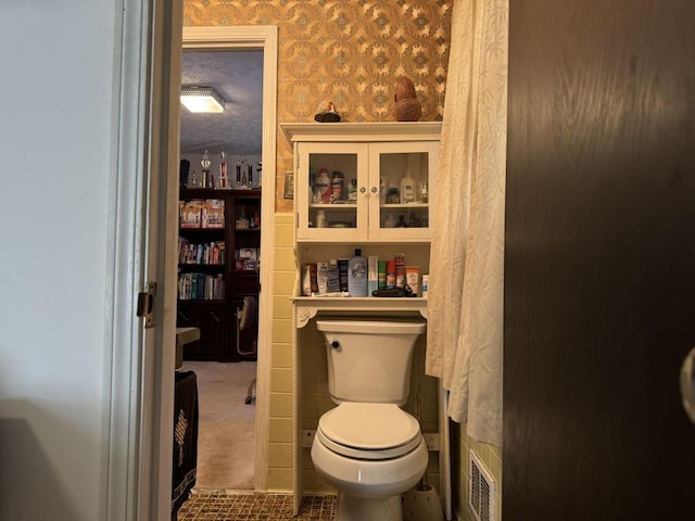 bathroom featuring toilet