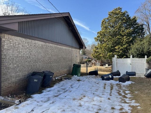 view of snow covered property