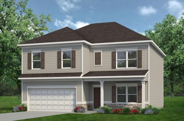 view of front facade with a front yard and a garage