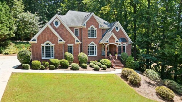 view of front of home with a front yard