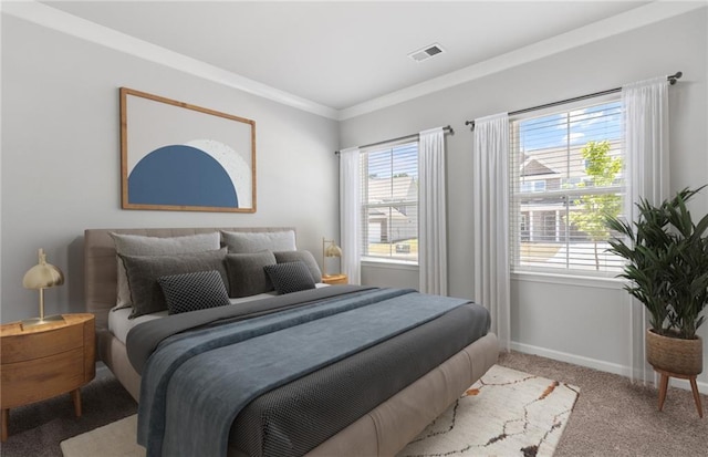 carpeted bedroom featuring ornamental molding