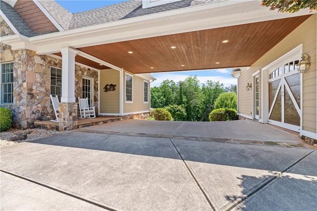 view of patio / terrace with a carport