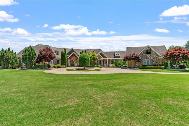 view of front of home with a front lawn