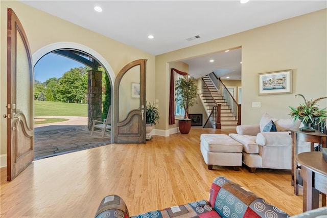 entrance foyer with light hardwood / wood-style flooring