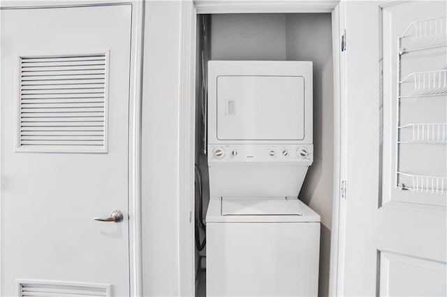 44 Peachtree Pl NE Unit 1929, Atlanta, GA 30309 - laundry room with stacked washer / dryer