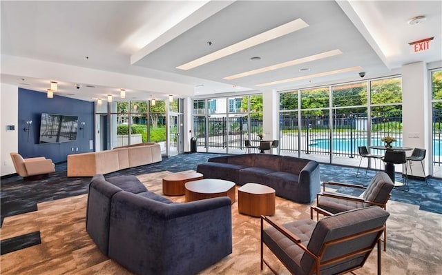 44 Peachtree Pl NE Unit 1929, Atlanta, GA 30309 - common area with floor to ceiling windows