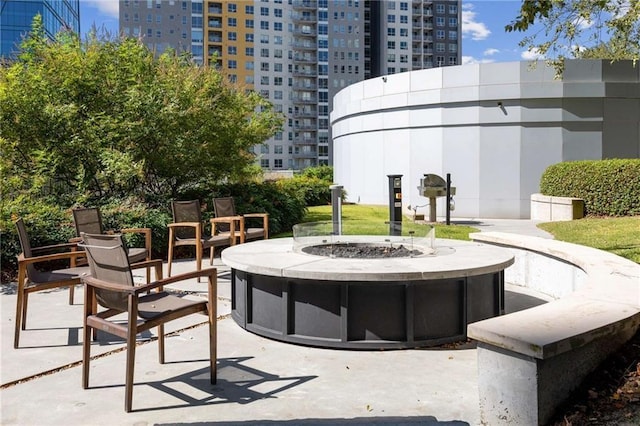 44 Peachtree Pl NE Unit 1929, Atlanta, GA 30309 - view of community featuring a fire pit and a patio area