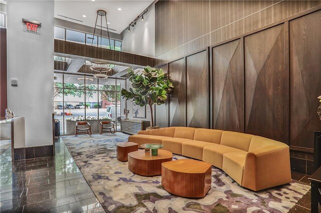 44 Peachtree Pl NE Unit 1929, Atlanta, GA 30309 - community lobby featuring a high ceiling
