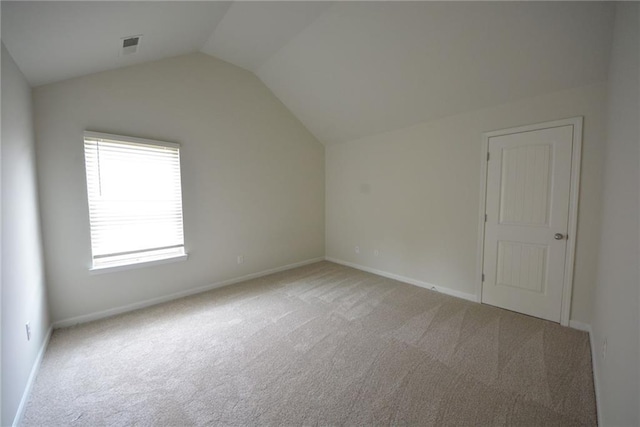 bonus room featuring carpet, lofted ceiling, and baseboards