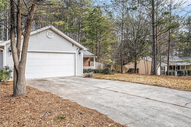 view of side of home with a garage