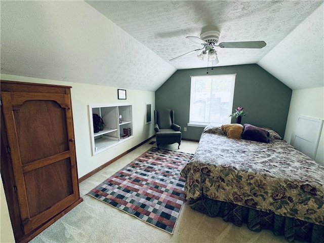 2606 Ramblewood Ct, Acworth, GA 30102 - bedroom featuring ceiling fan, light colored carpet, lofted ceiling, and a textured ceiling