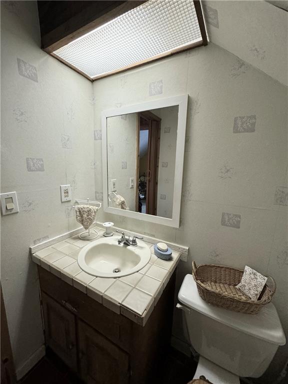 2606 Ramblewood Ct, Acworth, GA 30102 - bathroom featuring vanity and toilet