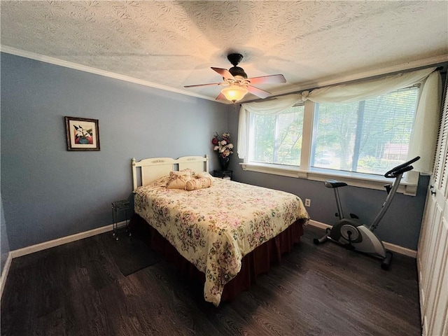2606 Ramblewood Ct, Acworth, GA 30102 - bedroom with dark hardwood / wood-style flooring, ceiling fan, ornamental molding, and a textured ceiling