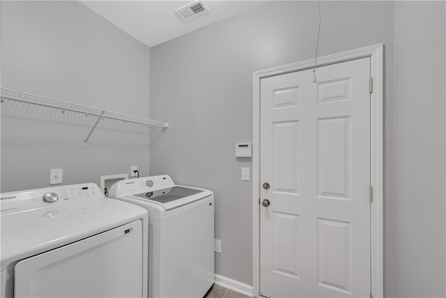 903 Duncan Ter, Canton, GA 30115 - laundry room featuring washer and dryer and baseboards