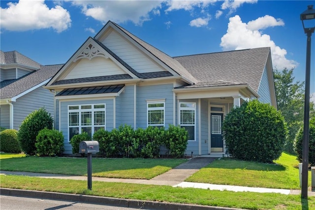 903 Duncan Ter, Canton, GA 30115 - view of front of home with a front lawn and a shingled roof