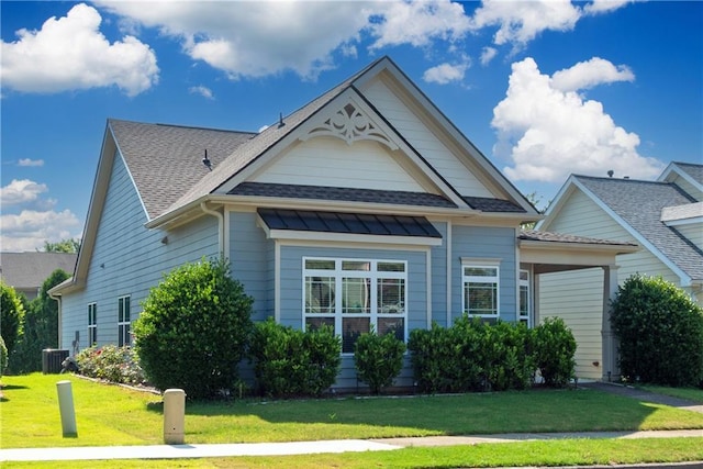 903 Duncan Ter, Canton, GA 30115 - view of front of house featuring a front yard and a shingled roof