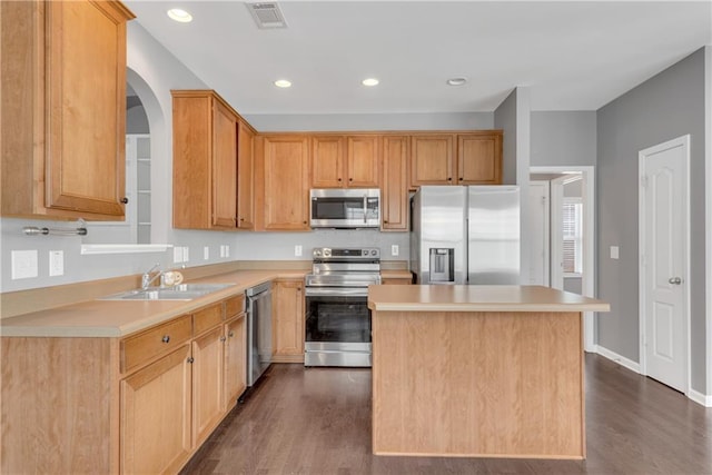 903 Duncan Ter, Canton, GA 30115 - kitchen featuring stainless steel appliances, dark wood-type flooring, a center island, light countertops, and recessed lighting