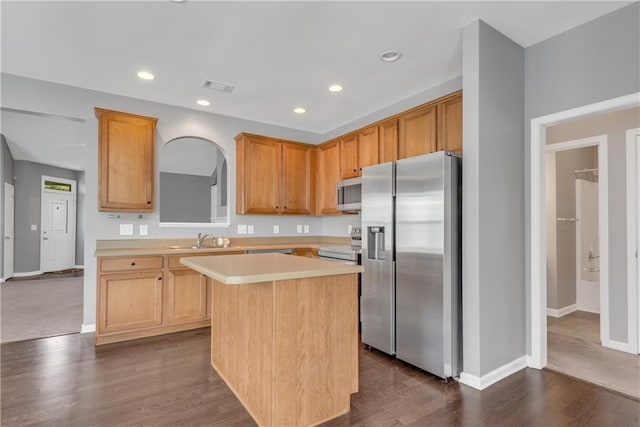 903 Duncan Ter, Canton, GA 30115 - kitchen with appliances with stainless steel finishes, a center island, light countertops, dark wood-style floors, and recessed lighting