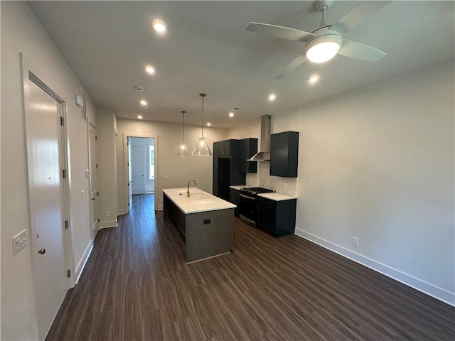 962 Bibbs Cir NW Unit 6, Atlanta, GA 30318 - kitchen featuring wall chimney range hood, baseboards, a sink, dark wood-style flooring, and light countertops