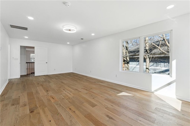 unfurnished living room with light wood-type flooring