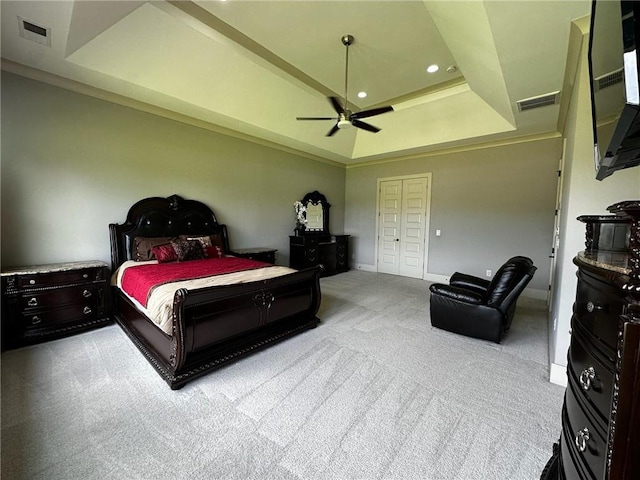 2657 Gray Mill Way, Loganville, GA 30052 - bedroom with light carpet, a tray ceiling, baseboards, ceiling fan, and recessed lighting
