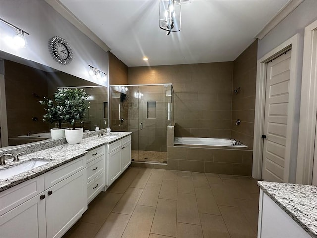 2657 Gray Mill Way, Loganville, GA 30052 - full bathroom featuring tile patterned flooring, double vanity, a shower stall, and a bath
