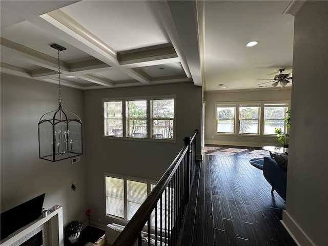 2657 Gray Mill Way, Loganville, GA 30052 - hallway with healthy amount of natural light, beamed ceiling, baseboards, coffered ceiling, and dark wood finished floors