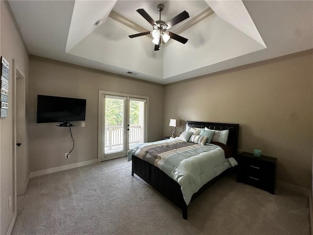2657 Gray Mill Way, Loganville, GA 30052 - carpeted bedroom with access to exterior, a raised ceiling, baseboards, and a ceiling fan