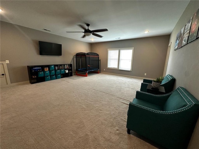 2657 Gray Mill Way, Loganville, GA 30052 - living area with a ceiling fan, carpet flooring, and baseboards